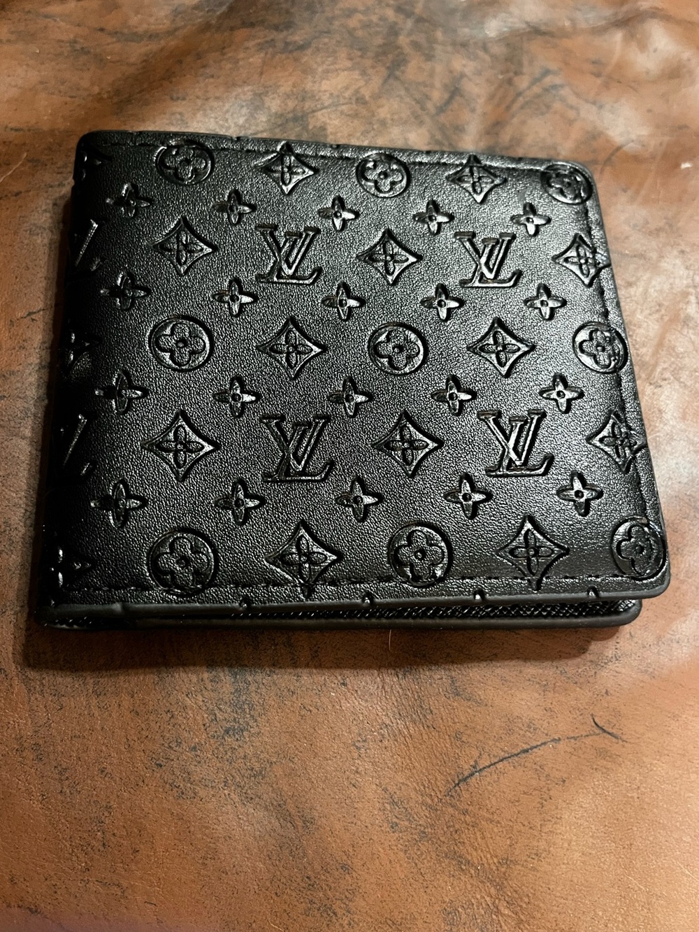 ⚫️ Louis. Vuitton. Embossed Letter Monogram Black Bi-Fold Wallet
